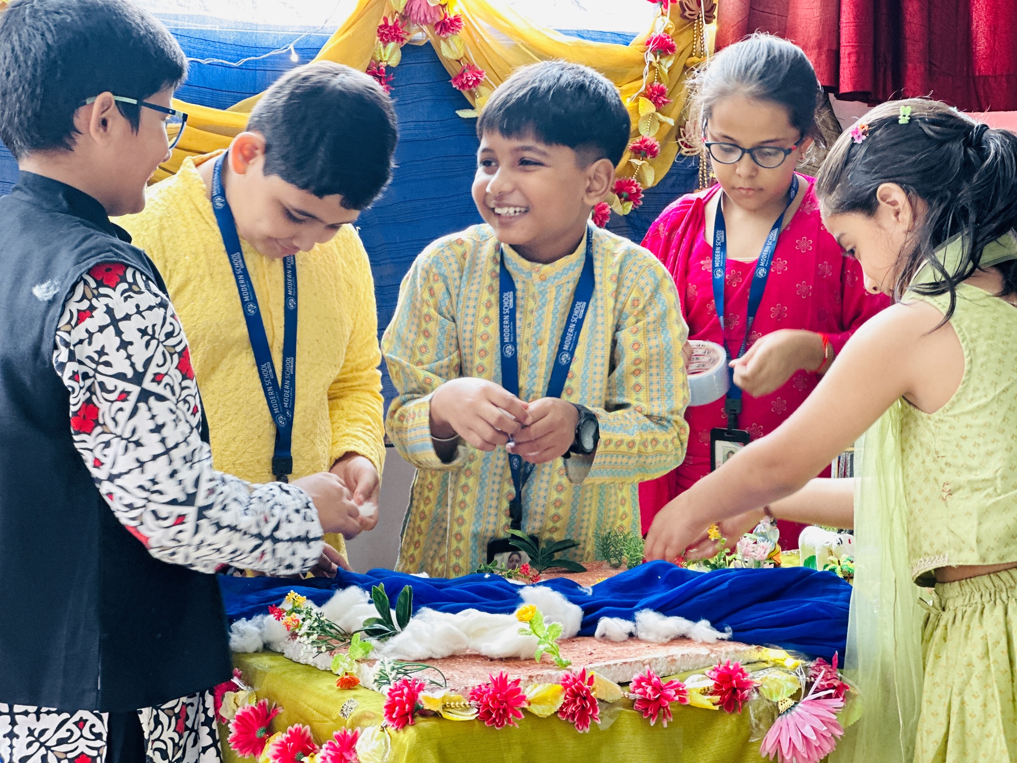 Students of Grades 3 and 4 preparing a jhanki depicting a scene from Lord Krishna&rsquo;s life